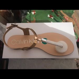 Brand new Calvin Klein gold/metallic brown sandals